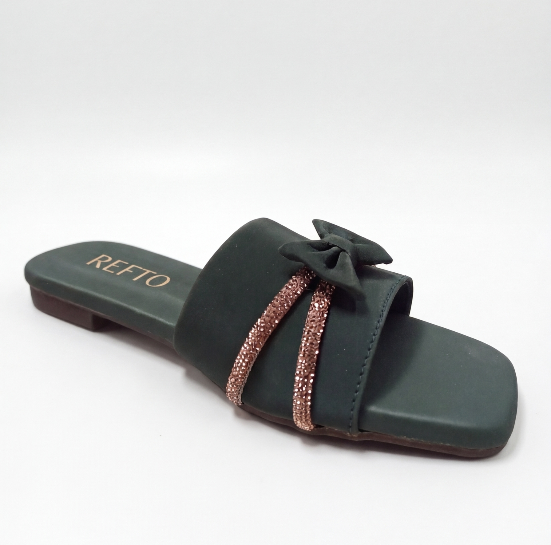 Women’s green slip-on sandal with bow detail and embellished strap