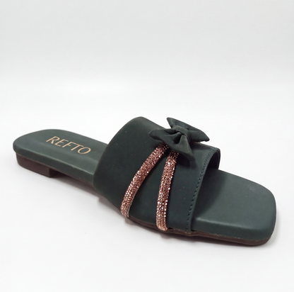 Women’s green slip-on sandal with bow detail and embellished strap